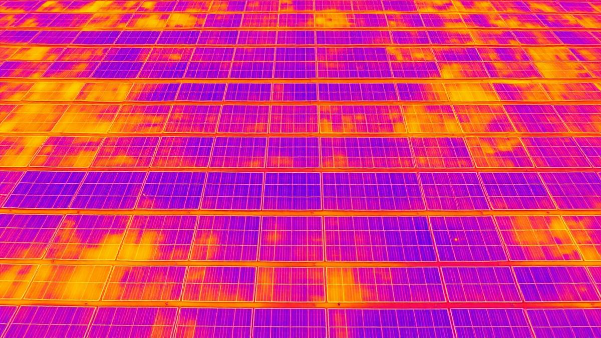 Thermal infrared aerial image of solar panels showing hot-spot cells